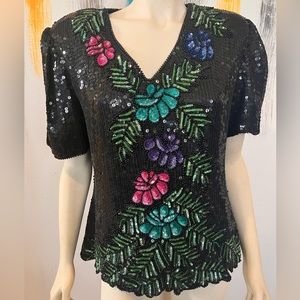 Sequin blouse with floral pattern